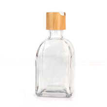 Custom 275ml clear square refillable hand sanitizer dispenser glass bottles with bamboo lid